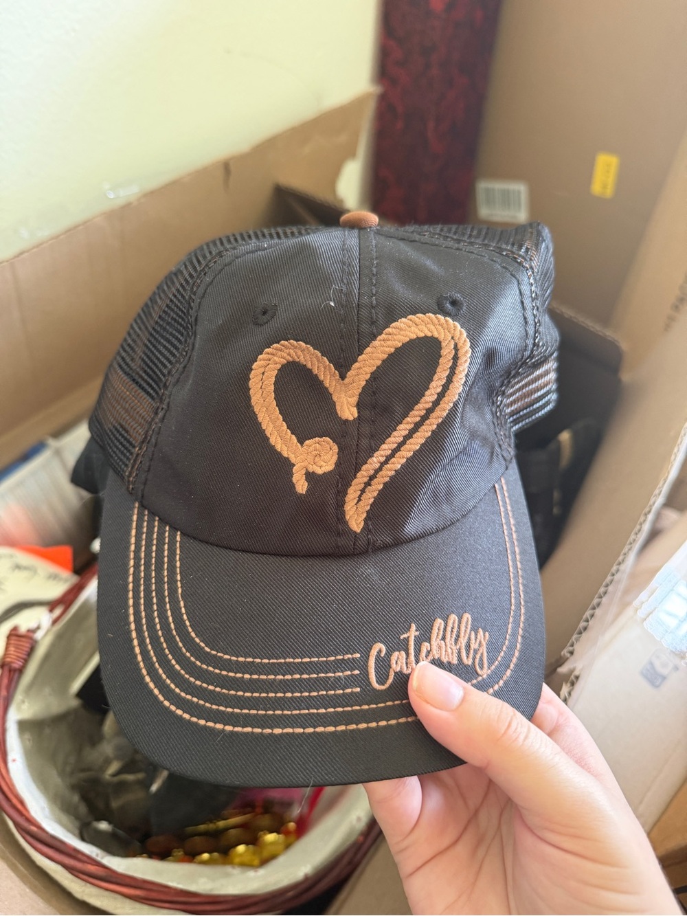 Black Trucker Hat with Copper Heart Stitching